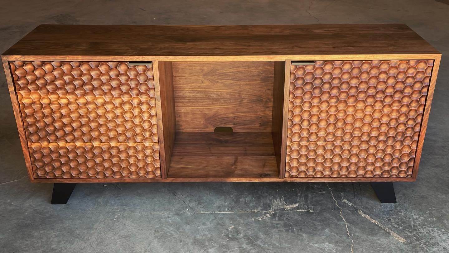 Solid walnut console cabinet finished with natural oil based wax wood finish.