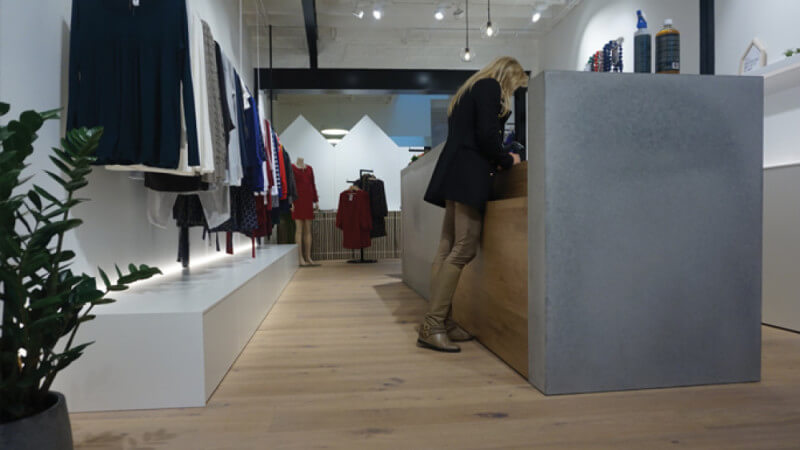 Clothing store in Belgium features wood floors finished with Rubio Monocoat.