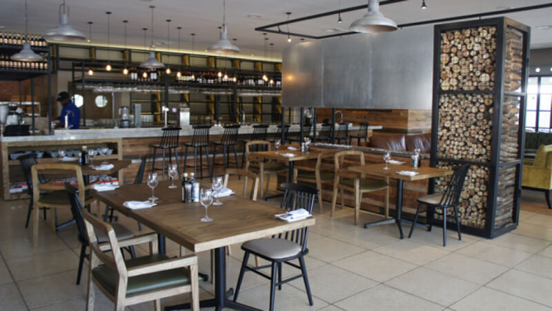 The rustic wood interior of a Brazilian restaurant.