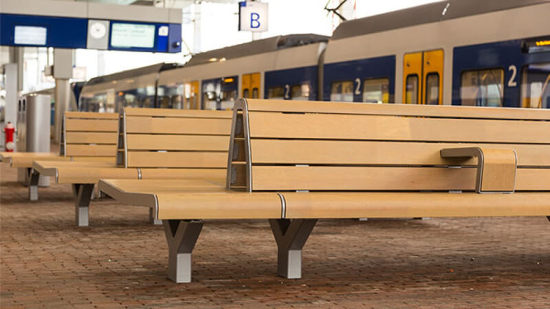 Wooden park benches finished with Rubio Monocoat's exterior hardwax oil.