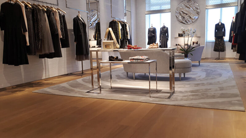 A boutique with light and creamy hardwood flooring.