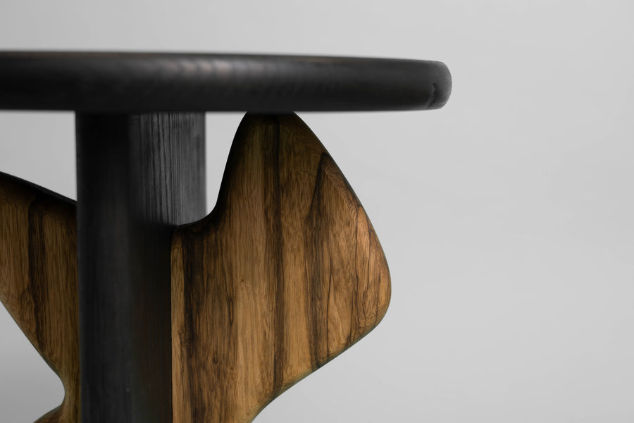 A close up of a unique side table made from black limba and white oak finished using Precolor Easy Intense Black and Oil Plus 2C Black and Pure.