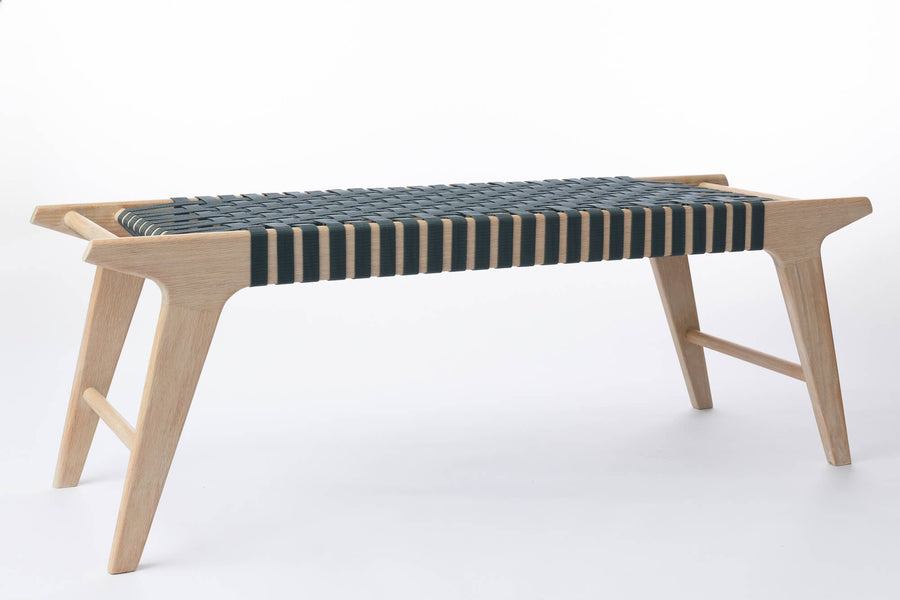 A bench crafted from red oak and finished using Rubio Monocoat Cotton White for a light but natural appearance.