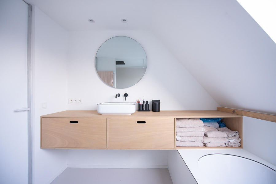 Bathroom with a floating vanity with a simple, minimalistic look finished with Oil Plus 2C hardwax oil wood stain and finish in one.