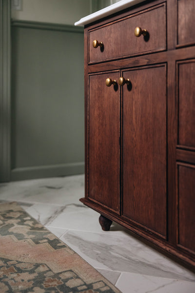 Close up of a white oak bathroom vanity finished using a custom mix of Oil Plus 2C colors. 