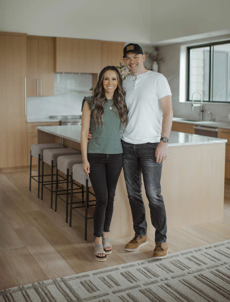 Mike and Michelle Ranger, owners of Ranger Home NW standing in the kitchen they designed and constructed.