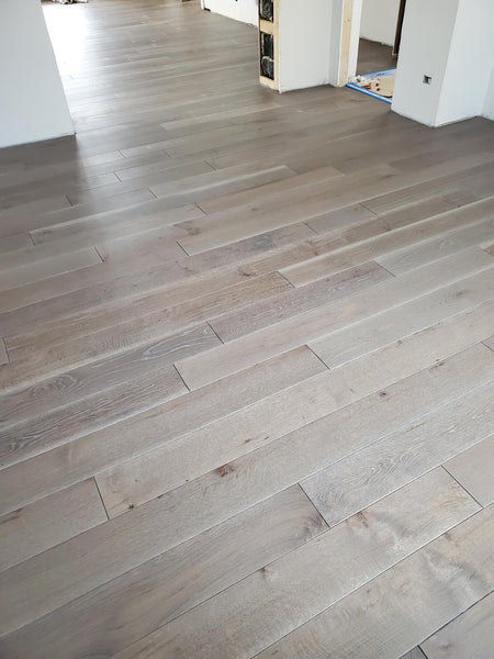 White oak flooring treated with Rubio Monocoat Pre-Aging.